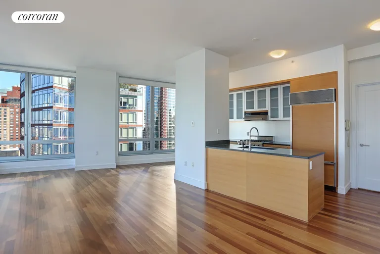 New York City Real Estate | View 30 West Street, PH1A | Living Room / Kitchen | View 2