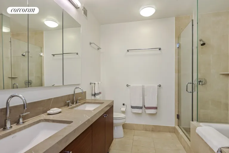 New York City Real Estate | View 30 West Street, PH1A | Primary Bathroom | View 6