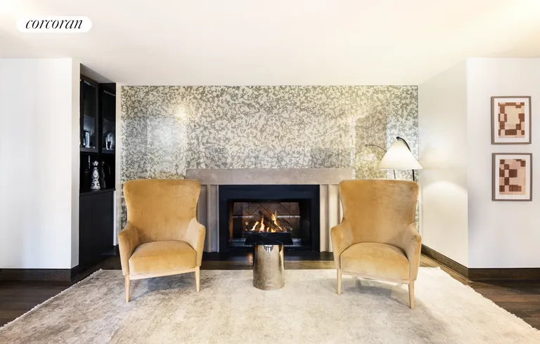 New York City Real Estate | View 111 West 57th Street, 12N | Living Room with Fireplace | View 2