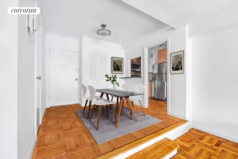 New York City Real Estate | View 301 East 48th Street, 6L | Foyer with dining area | View 2