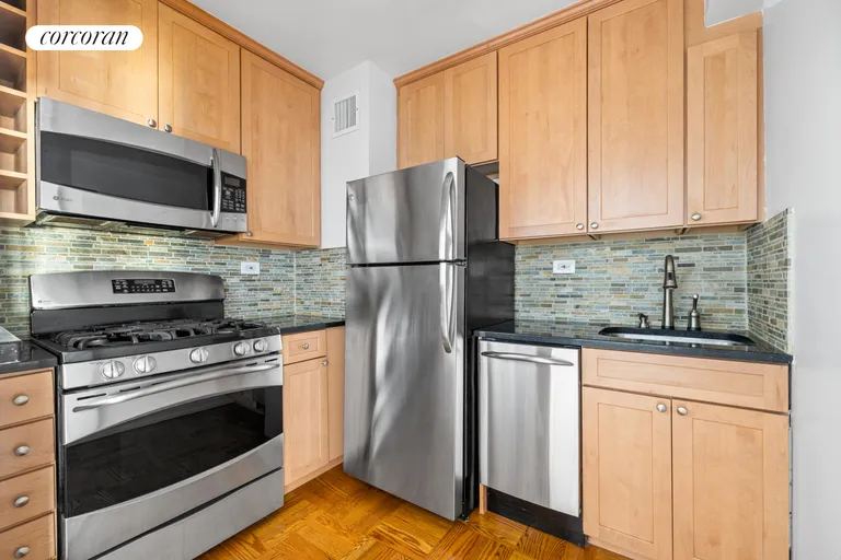 New York City Real Estate | View 301 East 48th Street, 6L | Renovated kitchen | View 4