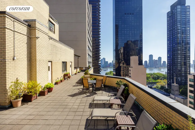 New York City Real Estate | View 301 East 48th Street, 6L | Common roof deck | View 6