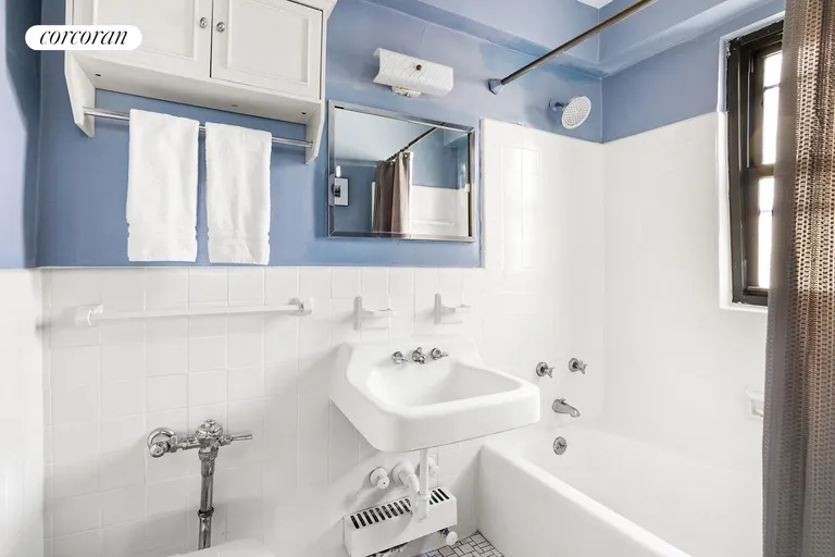 New York City Real Estate | View 245 East 24th Street, 9D | Windowed bathroom | View 5