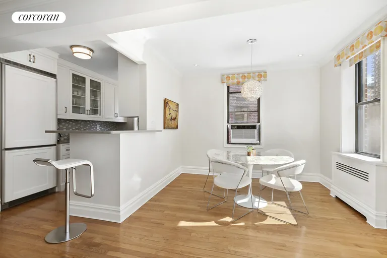 New York City Real Estate | View 30 East 9th Street, 6NN | Dining area and open Kitchen | View 4