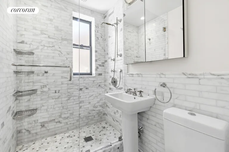 New York City Real Estate | View 30 East 9th Street, 6NN | Marble Bath | View 8