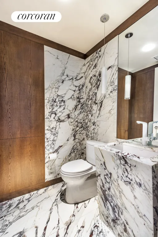 New York City Real Estate | View 35 West 15th Street, 21A | Half Bathroom | View 5