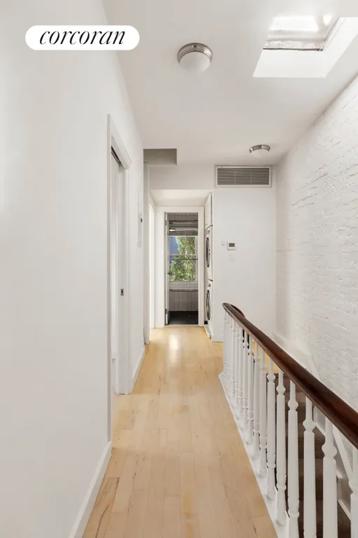 New York City Real Estate | View 287 Hoyt Street | Hallway Top Floor | View 18