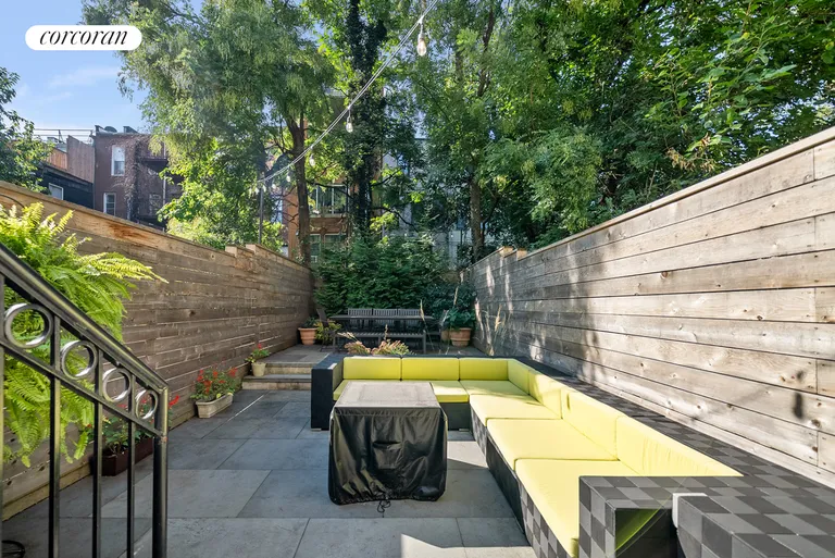 New York City Real Estate | View 238 West 132nd Street | Modern, fenced backyard | View 11
