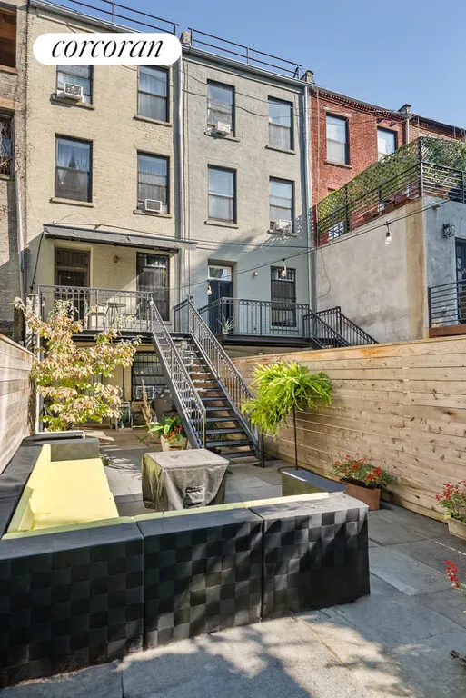 New York City Real Estate | View 238 West 132nd Street | View of the back | View 9