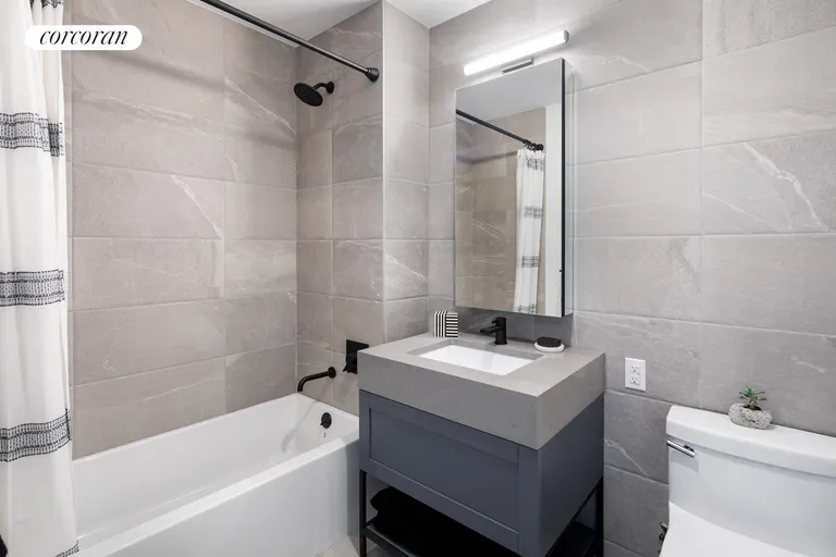 New York City Real Estate | View 36-20 Steinway Street, 223 | Full Bathroom | View 8
