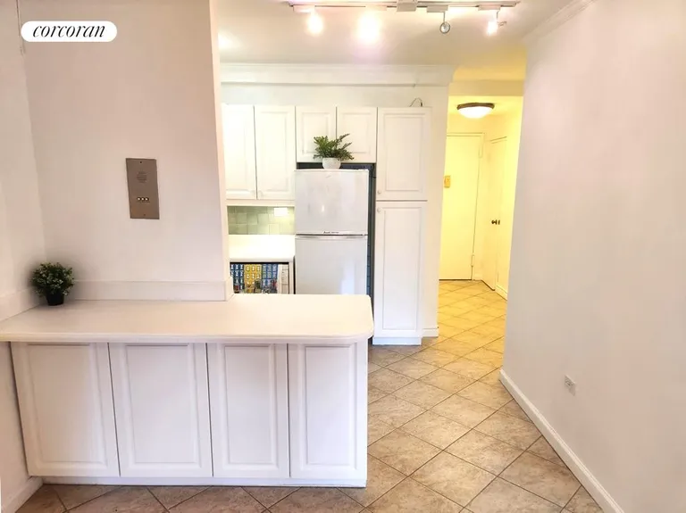 New York City Real Estate | View 122 Ashland Place, 5E | Kitchen counter with storage | View 4