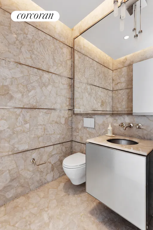 New York City Real Estate | View 217 West 57th Street, 49D | Half Bathroom | View 15