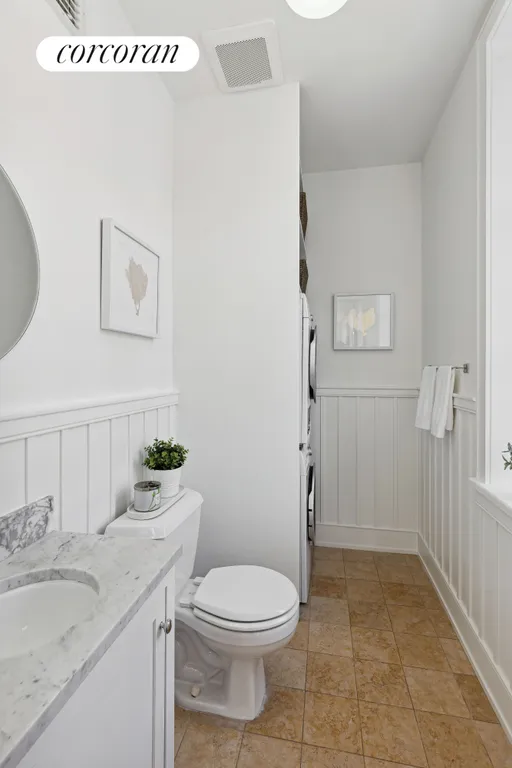 New York City Real Estate | View 142 Prospect Park West, 2 | Half Bathroom & Laundry | View 7