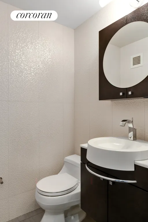 New York City Real Estate | View 160 West 66th Street, 27E | Virtually Staged Half Bathroom | View 6