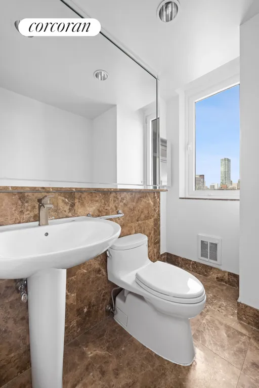 New York City Real Estate | View 100 United Nations Plaza, 35E | Windowed powder room | View 8