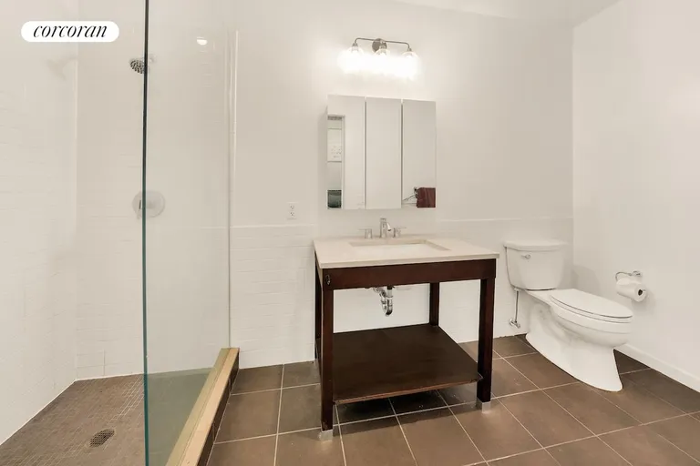 New York City Real Estate | View 365 Bridge Street, 7E | Bathroom with shower - ensuite | View 8