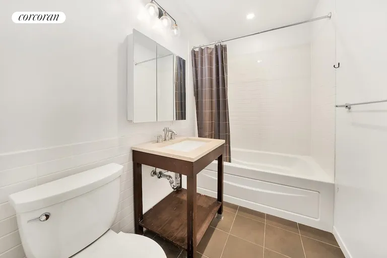 New York City Real Estate | View 365 Bridge Street, 7E | Bathroom with shower/tub | View 9