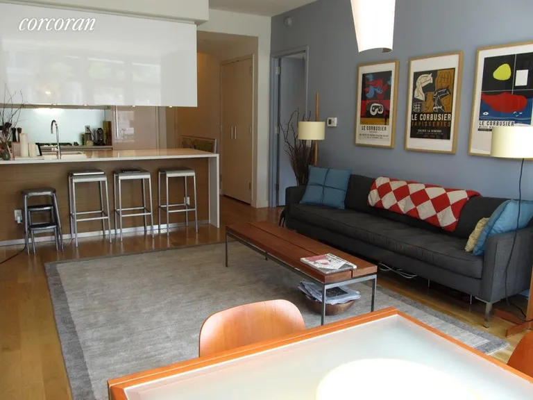 New York City Real Estate | View 555 West 59th Street, 6D | Wide living room with high ceilings | View 2