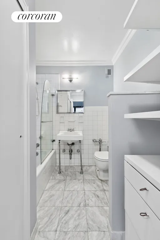 New York City Real Estate | View 166 East 61st Street, 10M | Bathroom | View 4