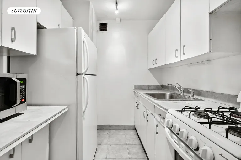 New York City Real Estate | View 166 East 61st Street, 10M | Kitchen | View 3