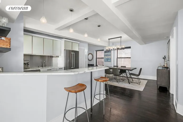 New York City Real Estate | View 315 West 23rd Street, 8E | Kitchen and Dining Area | View 3