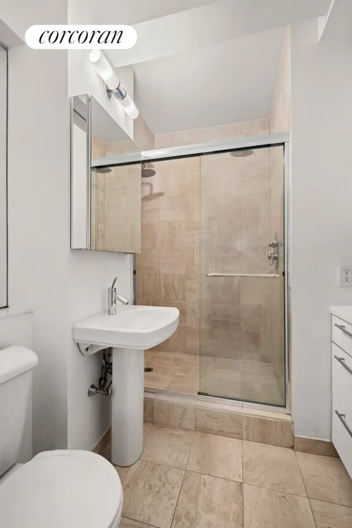 New York City Real Estate | View 315 West 23rd Street, 8E | Primary bathroom | View 10