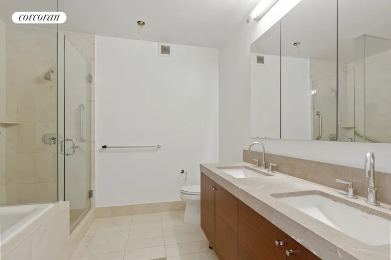 New York City Real Estate | View 30 West Street, 20B | Primary Bathroom | View 9