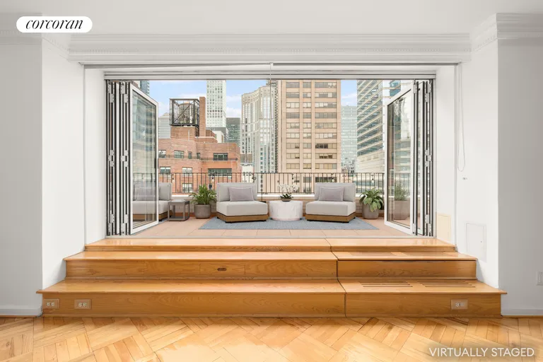 New York City Real Estate | View 200 EAST 58TH STREET, 18C | Glass Walls Fold Open | View 3