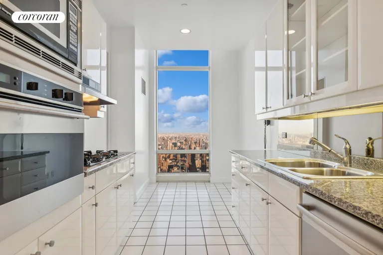 New York City Real Estate | View 845 United Nations Plaza, 83D | Eat in Kitchen with a view | View 10