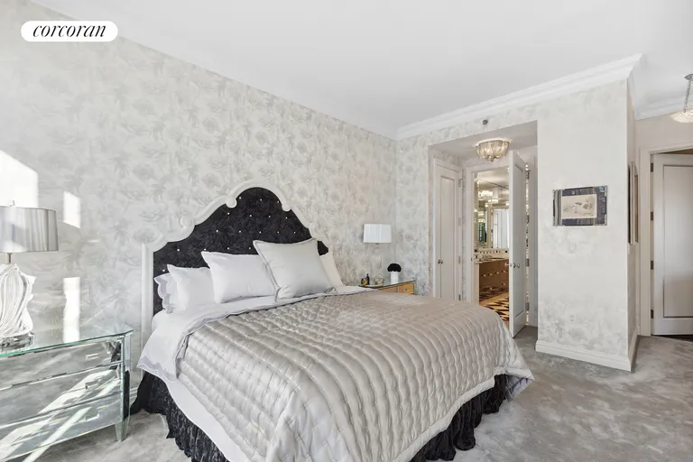 New York City Real Estate | View 400 East 51st Street, 15C | Primary bedroom and ensuite bath | View 3