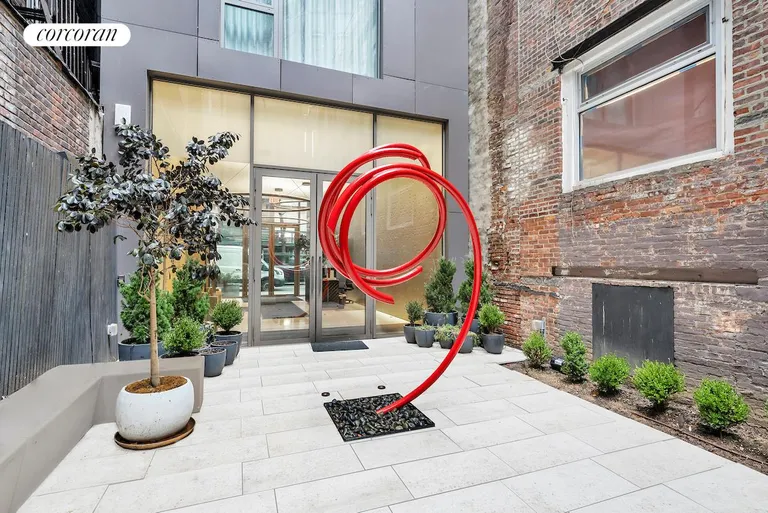 New York City Real Estate | View 80 East 10th Street, 7 | Courtyard | View 18