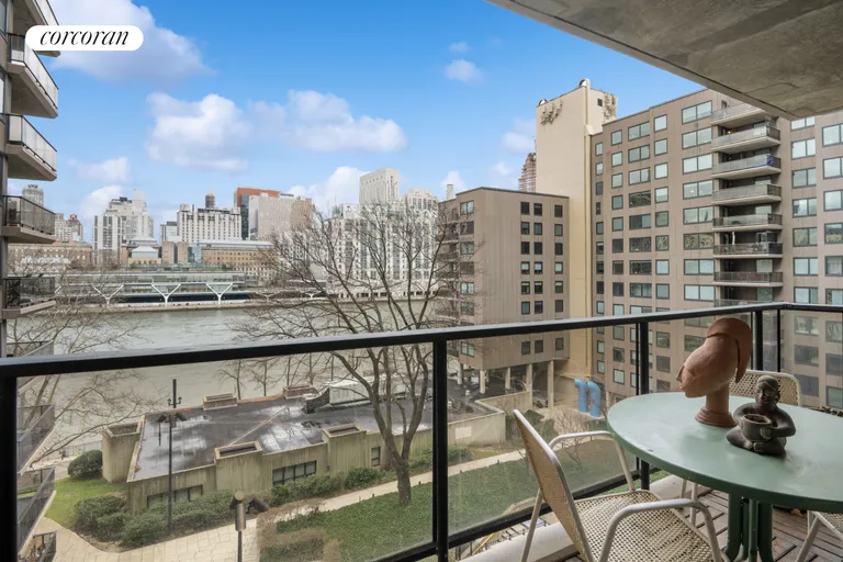 New York City Real Estate | View 531 Main Street, 601 | Manhattan & Courtyard Balcony View | View 2
