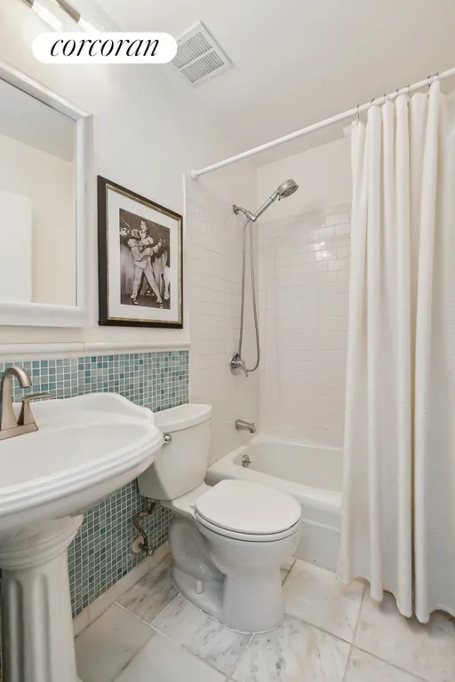 New York City Real Estate | View 35 East 10th Street, 4K | Lower Level Full Bath w/ Tub | View 6
