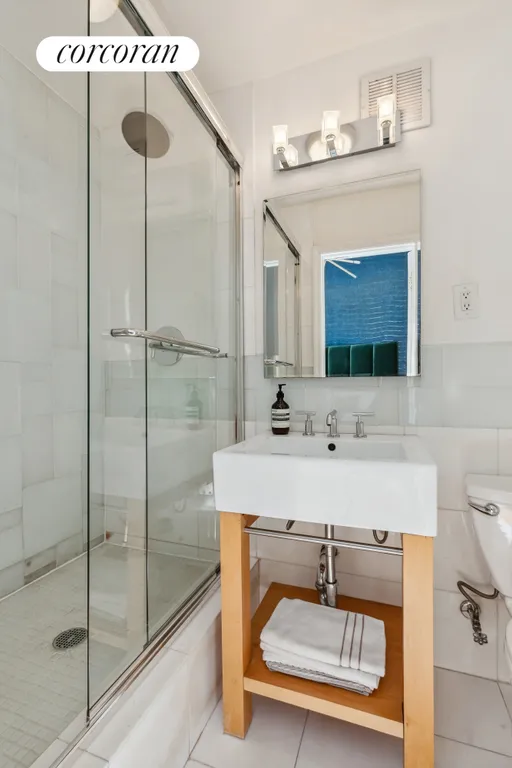 New York City Real Estate | View 35 East 10th Street, 4K | Upper Level Full Bath w/ Shower | View 7