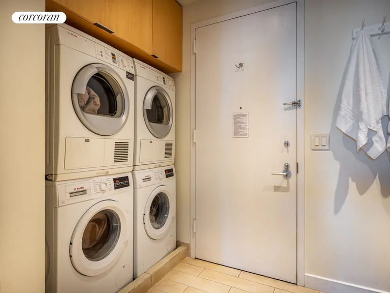 New York City Real Estate | View 200 Chambers Street, 24CDE | Laundry Room in Apt | View 16
