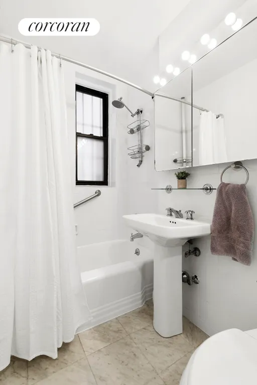 New York City Real Estate | View 30 East 9th Street, 4B | Windowed Bathroom | View 6