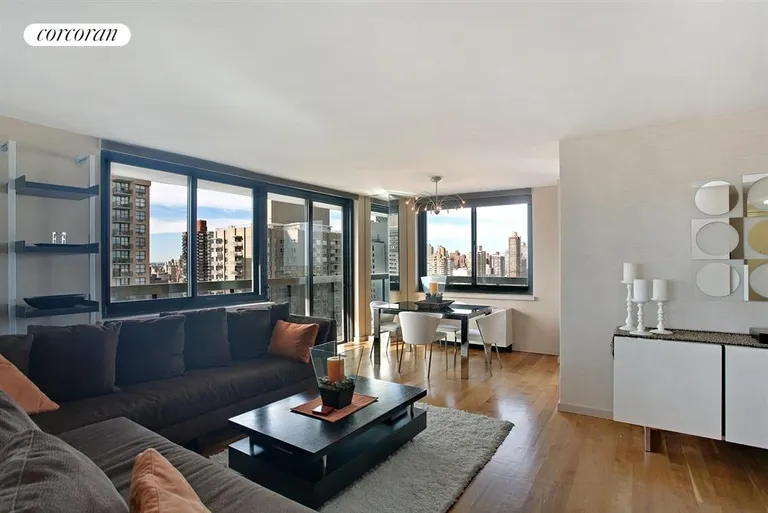New York City Real Estate | View 515 East 72nd Street, 30H | Expansive Living Room & Dining Room | View 9