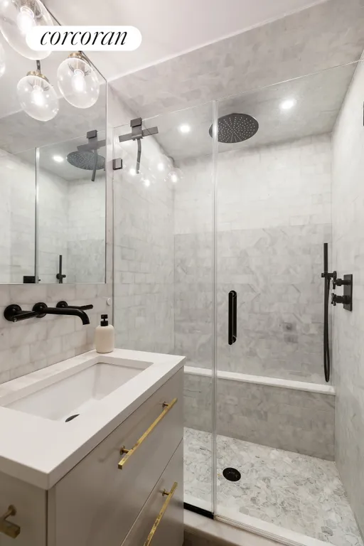 New York City Real Estate | View 453 West 43rd Street, B | Primary Bathroom | View 12