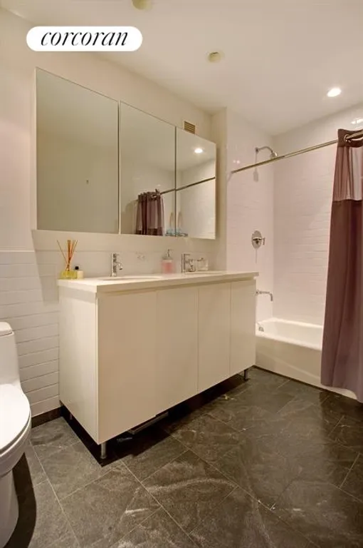 New York City Real Estate | View 90 William Street, 3C | Master Bathroom with Double Sinks | View 4