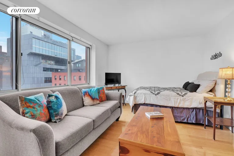 New York City Real Estate | View 555 West 23rd Street, N9G | Living Area/Bedroom Alcove | View 2