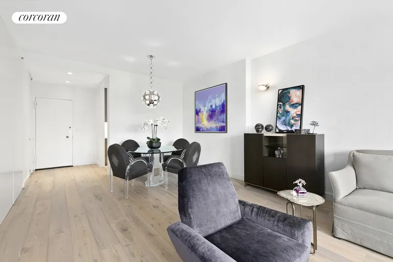 New York City Real Estate | View 785 Fifth Avenue, 9B | Living Room with Dining Area | View 6