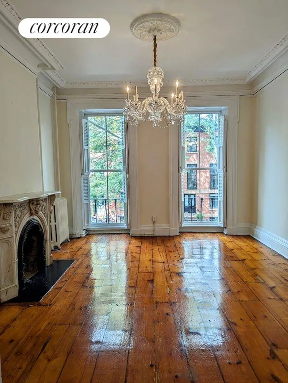 New York City Real Estate | View 57 Tompkins Place | Parlor With Original Details | View 6