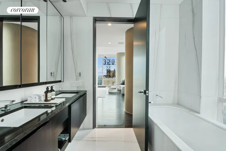 New York City Real Estate | View 157 West 57th Street, 46A | Primary Bathroom | View 10