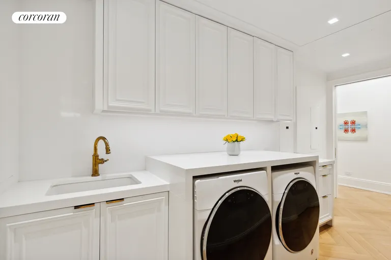 New York City Real Estate | View 730 Park Avenue, 7C | Laundry Room in Apt | View 12