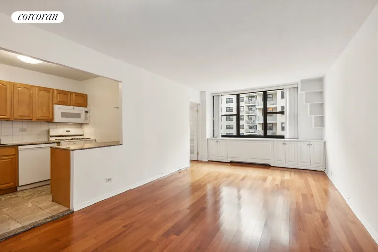 New York City Real Estate | View 301 East 87th Street, 14E | Living room w open kitchen | View 2