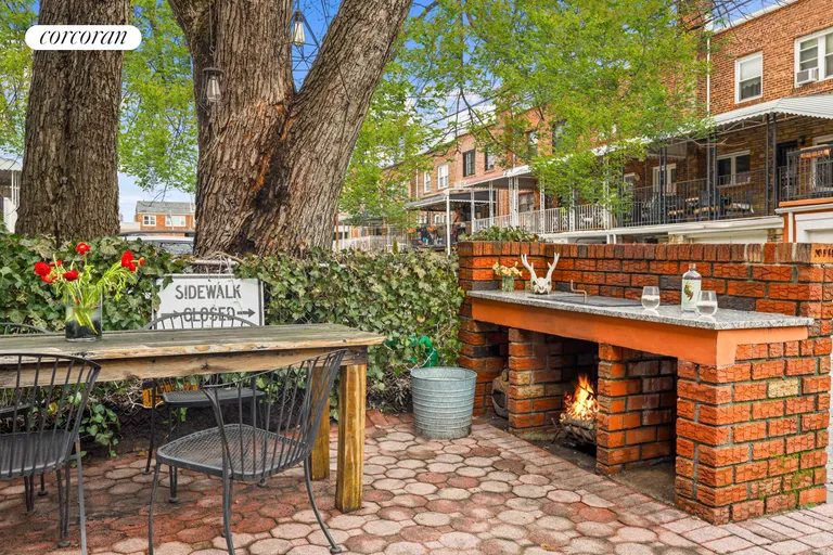 New York City Real Estate | View 23-23 33rd Road | Fireplace & BBQ | View 24