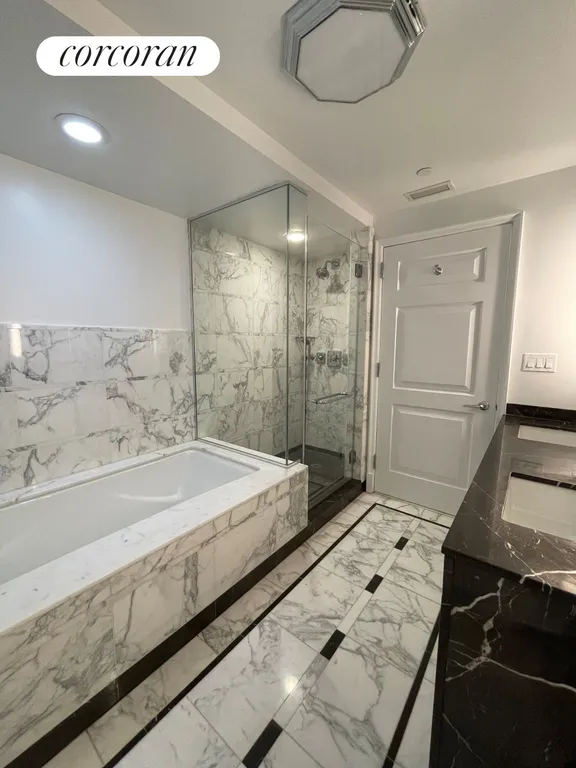 New York City Real Estate | View 205 East 85th Street, 7L | En suite primary bathroom | View 4