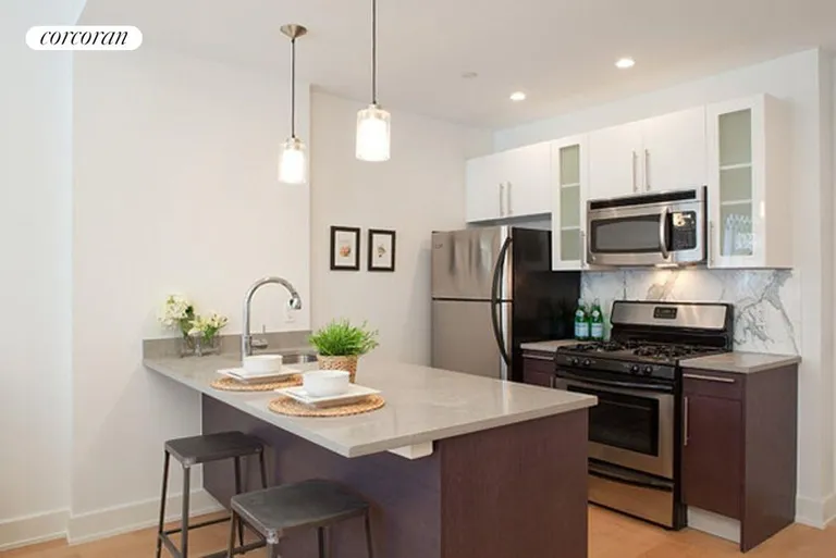 New York City Real Estate | View 12 Monitor Street, 3A | Kitchen | View 2
