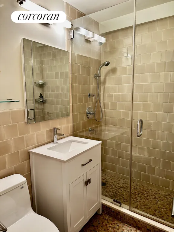 New York City Real Estate | View 225 East 57th Street, 9D | Primary Bathroom | View 6