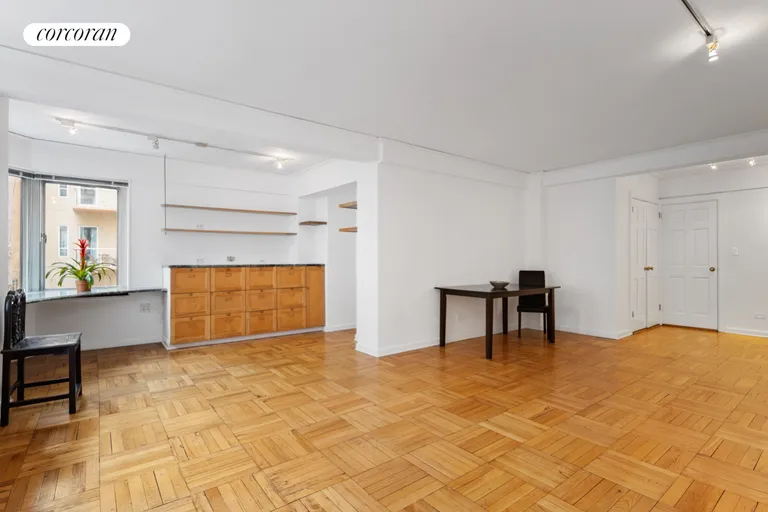 New York City Real Estate | View 249 East 48th Street, 4A | Living space with dining area | View 2